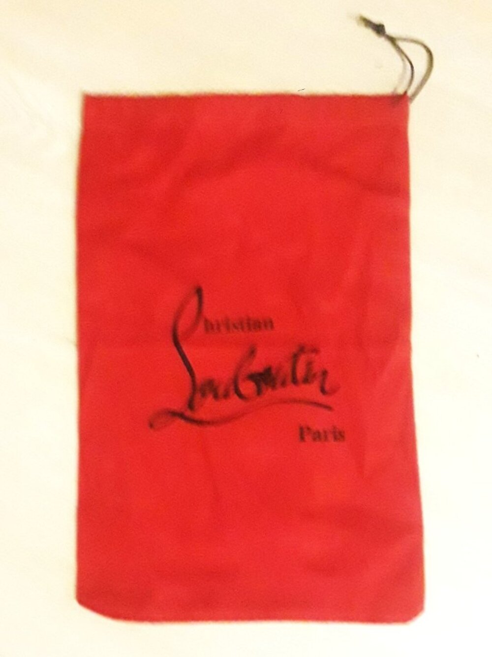 Christian Louboutin trademark dust bag